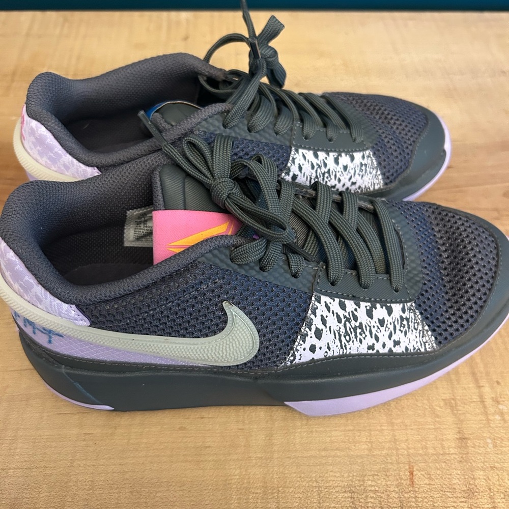 Nike Gray and Purple Sneakers with Sporty Design